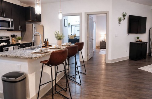 Westside Apartment | Skyline Lux Retreat: Pool & City Views