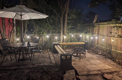 Mary Esther House | Sleeps 8! Pet friendly retreat by the beach + movie room and large fenced yard