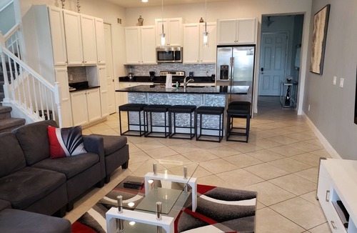 Davenport House | Spacious 5-bedroom townhome in charming Champions Gate/Davenport with AC and gym