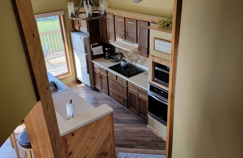 Mancelona Condo | Spacious 5 beds,2 full baths Golf, ski, Sleeps 7, KING bed, Wi-Fi close to Lakes