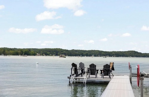 Rapid City House | Spacious FAMILY-FRIENDLY 6-bedroom home on Torch Lake Sandbar