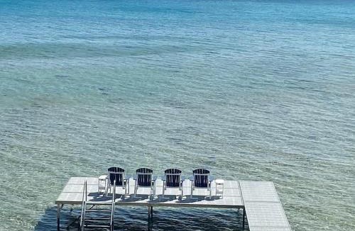 Suttons Bay House | Spectacular Suttons Bay Stay - Game Room Kayaks Pizza Oven & More