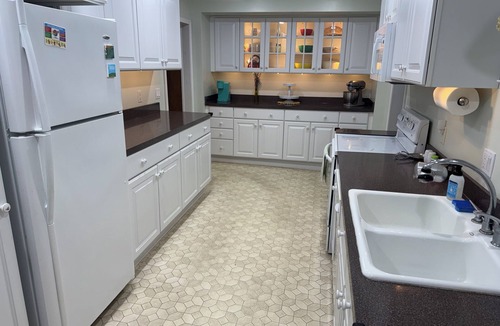 Cheboygan House | Steps from your snowmobile adventure! Cabin feel in the City Book while you can!