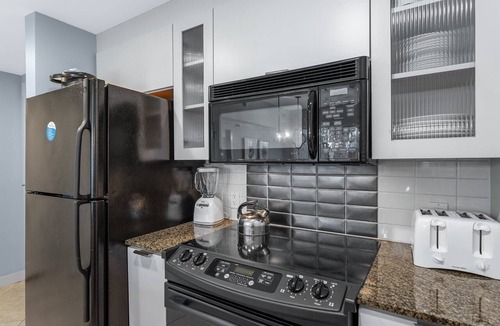 Baytowne Wharf Condo | Stunning 2BR Bahia Condo at Wharf! Beach Tram, Tropical Pool, Hot Tub, Patio.