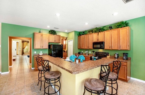 Watersong Cottage | Stunning Cottage with Games and Swimming Pool in Davenport, Florida