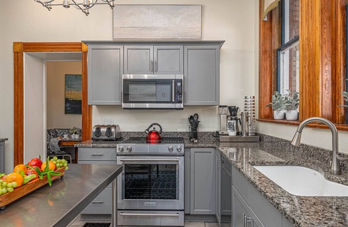 Historic Downtown Savannah House | Stunning Downtown c.1890 Estate + Wraparound Porch by Lucky Savannah