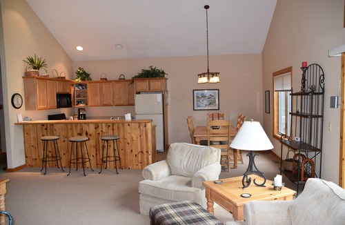 Mancelona Condo | Stunning Knotty Pine Condo at Schuss Mountain