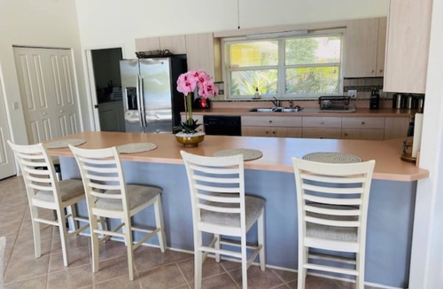 Palm Coast House | Stunning Lake house,heated pool, pet friendly, fishing spot ,restaurants ,bars