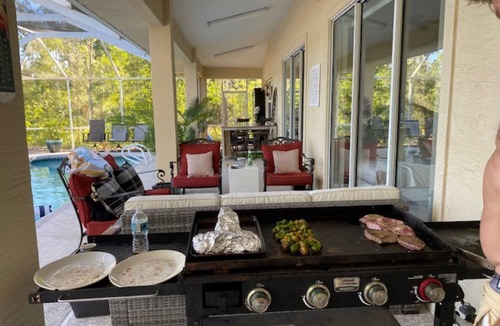Palm Coast House | Stunning Lake house,heated pool, pet friendly, fishing spot ,restaurants ,bars