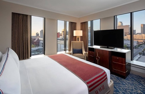 Arts/Warehouse District Hotel | Stylish Comfort With Private Balcony, A Short Drive to Arts Warehouse District!