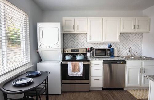 Five Points South Condo | Sunny City Flat | Vulcan’s Hideout A2 | King Bed