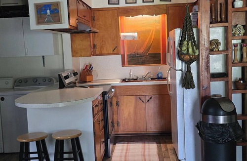 Negreet Cottage | Take a break and unwind on our waterfront screened in porch
