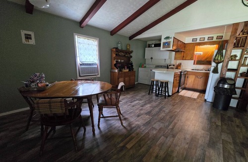 Negreet Cottage | Take a break and unwind on our waterfront screened in porch