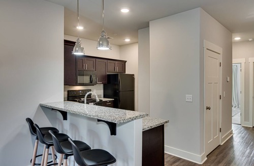Gracewood Apartment | The Alice: King Bed - Top Floor - Pool & Gym - WiFi - Washer/Dryer - Ft Gordon