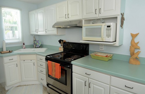 Seaside Homes House | The Dolphin House! Heated Pool home. Unlimited well mannered Pets Welcome