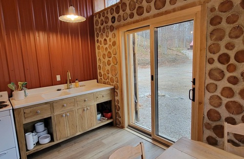 Central Lake Apartment | The Forge at Torch Lake: near lake access and boat ramp, boat trailer parking