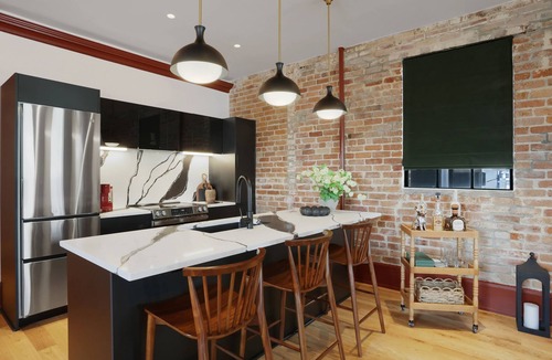 Faubourg Lafayette Apartment | The Gisele: 4br/4ba for 8 Pool + Streetcar Stop