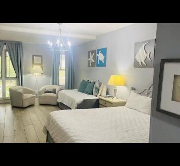 Baytowne Wharf Resort | The Grand Sandestin Golf & Beach Resort Studio sleeps four shuttle to private beach