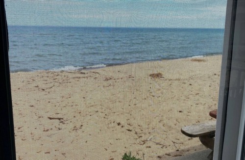 Long Lake Cottage | The Oasis- Haven on HuronnBeachfront cabin on the sands of Lake Huron!