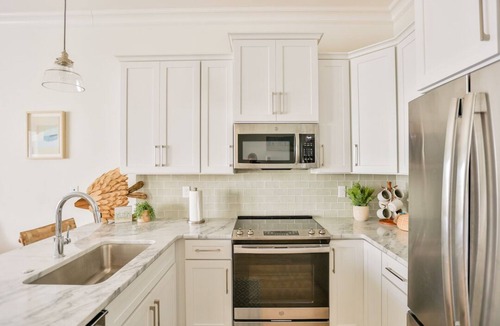 Gulf Shores Cottage | The Sand Haus - Steps to Beach - 7 Separate Beds - Pet Friendly - Pool - Grill