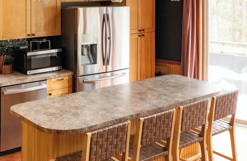 Central Lake Cabin | The Wild Pine - Torch Lake Retreat: Speakeasy, Hot Tub, Sauna, Golf Sim, Arcade