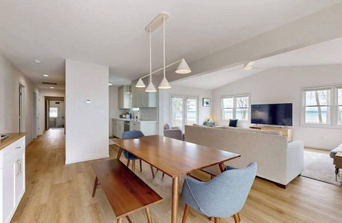 Suttons Bay House | Tranquil Lakeview Retreat in Suttons Bay, with a private sauna, & large yard