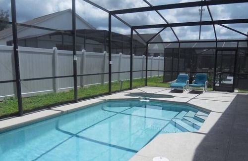 Sunset Ridge House | Treat Yourself with Private Pool at Sunset Ridge Davenport 5BR 3BA by RedAwning