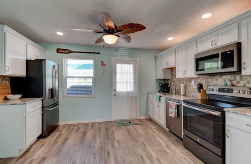 Sunny Shores House | Tropical Retreat, Pet Friendly, Fenced Yard, Wifi