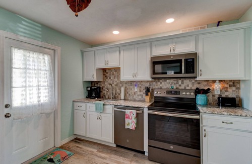 Sunny Shores House | Tropical Retreat, Pet Friendly, Fenced Yard, Wifi