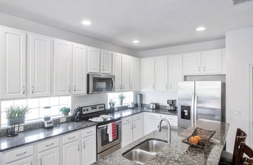 Sunridge Woods Villa | Ultimate 6 Bedroom 5 Bathroom Solterra Resort Home With Pool and Spa 12 Minutes From Disney