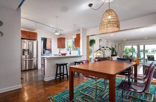 Audubon Park House | Vibrant Orlando Lakefront Cat Lover's Retreat with Pool & Gardens