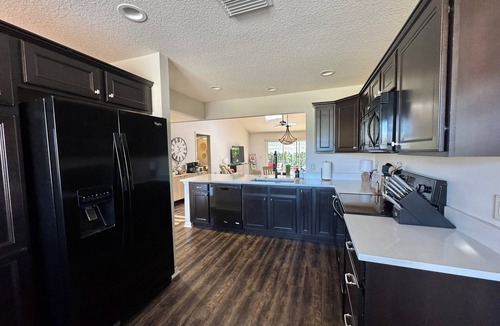 Village of Collier House | Walk to Brownwood Paddock Square, Golf cart included, open floor plan w/updates