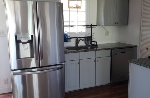 Palm Coast House | Walk to private beach from this cozy, pet friendly cottage in the Hammocks!