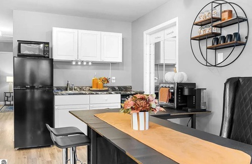 Elk Rapids House | Walking distance to local eateries, watering holes, beaches, grocery & shopping!