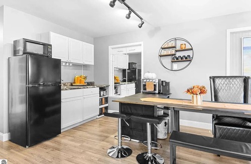 Elk Rapids House | Walking distance to local eateries, watering holes, beaches, grocery & shopping!