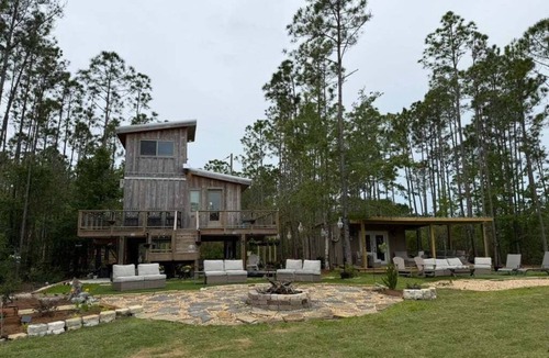Gulf Shores Cabin | Water + Woods – Unique Treehouse Retreat on 10 Private Acres in Gulf Shores