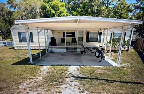 Satsuma House | Waterfront home in Satsuma. Two bedrooms each with full bath. Gas grill.