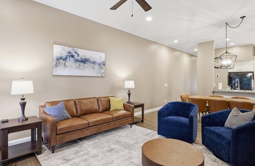 Jacksons' Gap House | Waterfront Lake Martin townhome sleeping 10. Features 2 king suites with private baths, a bunk room for 6, boat slip, dock access, boat ramp, 2 kayaks, and a screened porch. Just 30 miles from Auburn.