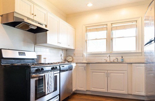 Westview House | Welcome home to this updated 1920s hilltop bungalow!