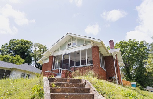 Westview House | Welcome home to this updated 1920s hilltop bungalow!