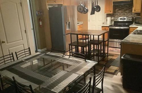 Ellenwood House | Where families & dogs dream 4BR home sleep 12 near ATL pool table Fun House BBQ