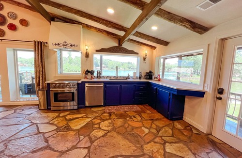 Royal House | Woodland Shore Villa | Spanish Themed Lakehouse
