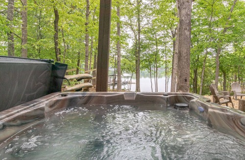 Martin House | Young@Hart is a Lakefront home w/Covered Dock, Game Room, 4 Kayaks & Hot Tub!
