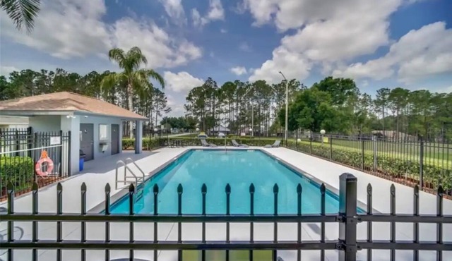 3-bedroom house with Pool and Movie room in charming Davenport. Enjoy your stay.