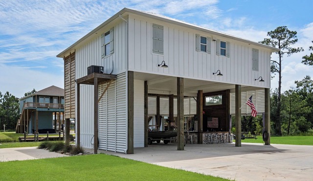 4-bedroom house in charming Bay St. Louis. Waterfront, pool and outdoor living!