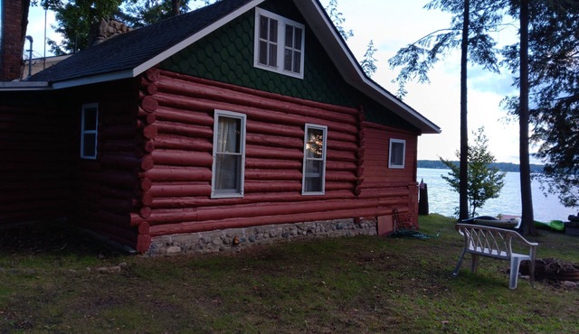 Beautiful full log cabin with direct private frontage , beautiful sunsets .