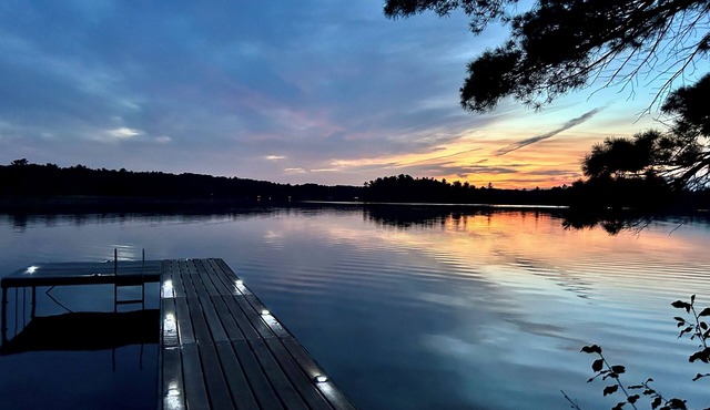 Cozy Traverse City Lake House: Hot Tub, Kayaks, Private Frontage & Sunset Views