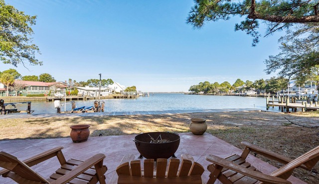 Ground level bay-front home on deep waterfront!