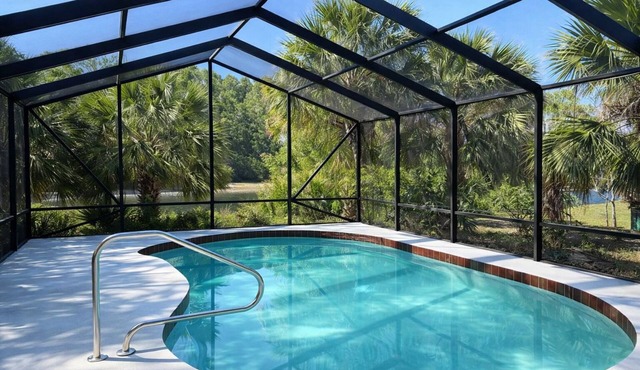 Heated pool home with a lake view!