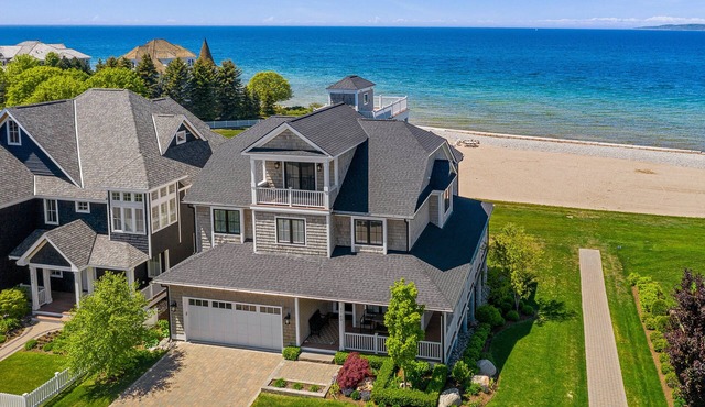 Lake-view luxury awaits at Serenity North 4 in Bay Harbor, MI, with 4 bedrooms.